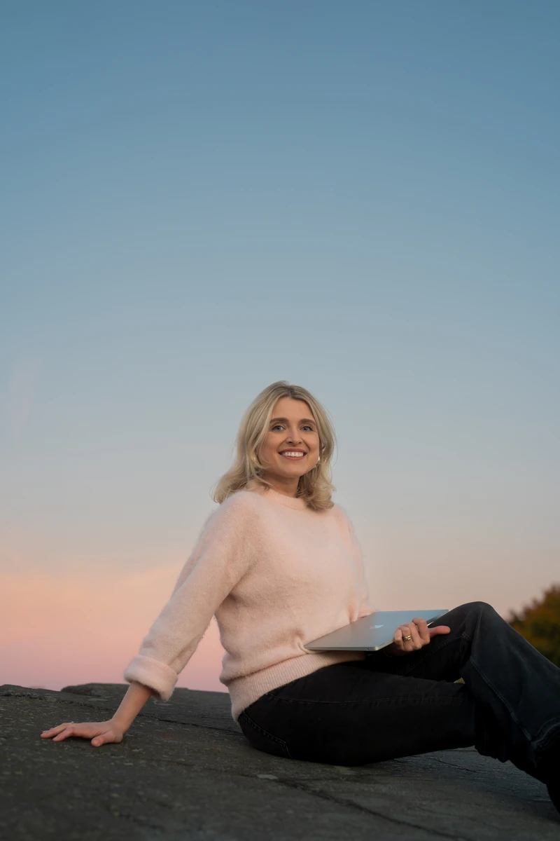 Joanna Numminen, ACCA-qualified founder of Numminen Advisory, against a dusk sky in Helsinki